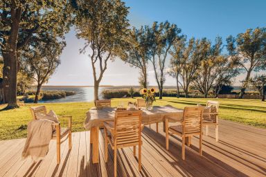Watermark Usedom - Premium Ferienhaus direkt am Wasser mit eigener Badestelle - Haus Welle