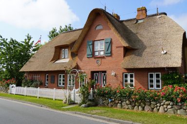 Ferien unterm Reetdach Whg 01