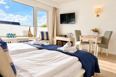 Seestern - Helles App. für 2 Pers. - Balkon, Stellplatz, WLAN. Haustiere erlaubt.