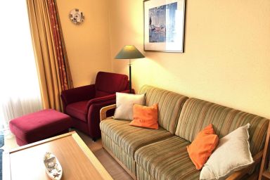 Hus Inselkieker - Familienfreundliche, strandnahe Maisonettewohnung mit Balkon und Blick zum Deich
