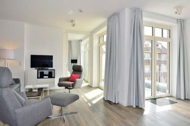Aparthotel Anna Düne - Hochwertiges Apartment am Nordseestrand mit sonnigen Süd-Balkonen und Strandkorb