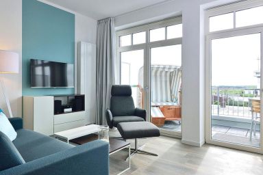 Aparthotel Anna Düne - Schickes Apartment an der See mit Westbalkon, Meerblick und eigenem Strandkorb!