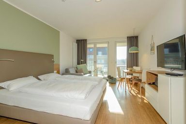 Apartmentvilla Anna See - Schönes Ferienapartment in Strandnähe mit sonniger Loggia & Saunabereich im Haus
