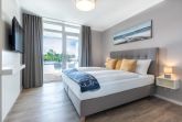 Schlafzimmer mit Zugang zur Loggia