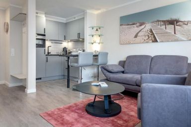 Sundowner - Moderne 2-Zimmerwohnung mit Stellplatz am Strand