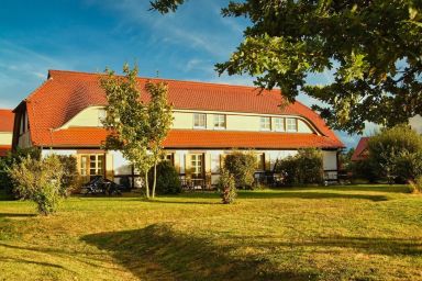 Feriendorf Bakenberg - strandnahe Ferienwohnung mit eigener Terrasse - Feriendorf Bakenberg FeWo D06