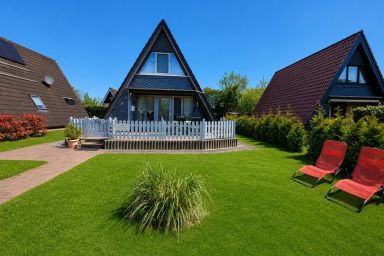 Nurdachhaus ANKERPLATZ JOSSI - Gemütliches und komfortables Nurdach-Ferienhaus im Ferienpark Fedderwardersiel