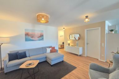 Ferienappartment Nordseenixe mit Sauna - Modernes Ferienappartment Nordseenixe mit Sauna, Balkon und Meerblick in Norden