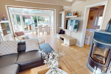 Feriendorf Südstrand - Ferienhaus für 6 Personen und Hund mit Kamin, Sauna und eingezäuntem Garten