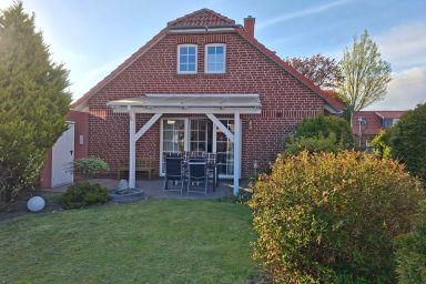 Freia en Uli - Freistehendes Ferienhaus in Norden mit Garten, Kaminofen & Terrasse