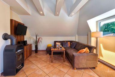 Küstenwaldhaus - Ferienwohnung Seestern: Sauna, Kamin & 550m zum Ostseestrand