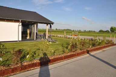 G13 Ferienhaus mit Garten und Fahrradschuppen