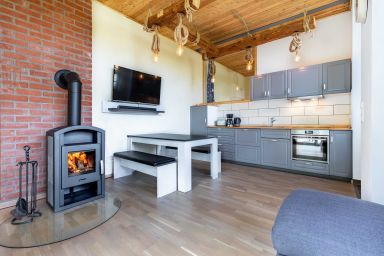 Ferienhaus Sonne, Mond und Sterne bei Kühlungsborn OFC 14 - Ferienwohnung Sonne mit Terrasse, Kamin und Garten