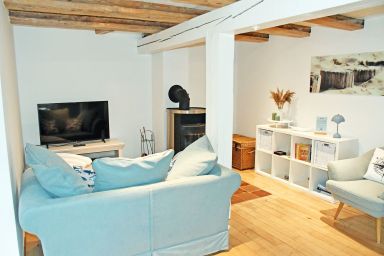 Ferienhaus Boddenblick unterm Reetdach mit Kamin und Sauna
