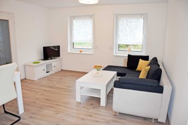 Baaber Ferienwohnungen zwischen Bodden und Ostseestrand - Ferienwohnung mit Terrasse zur Baaber Beek 03