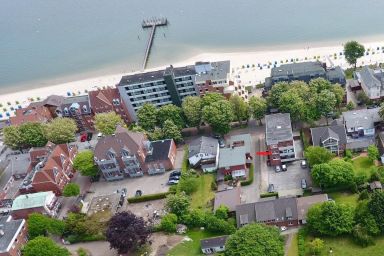 Wattwurm - Ferienwohnung Wattwurm - strandnah, Balkon mit Blick auf die Mühle