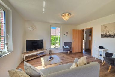 Ferienwohnung Schlickwanderer Groß - Ferienwohnung Schlickwanderer Groß mit eingezäunten Garten Hund willkommen
