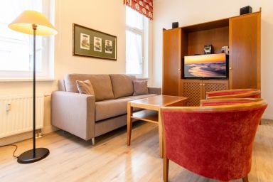 Villa Aegir - Ferienapartment an der Ostsee mit Wintergarten - Saunanutzung im Haus inklusive!