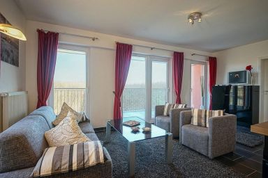 NordseeResort Friesland - Stilvolles Ferienapartment mit Balkon am Nordseedeich, Sauna und Whirlbadewanne