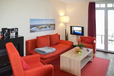Resort Deichgraf - Ruhige, schöne Wohnung in Strandnähe mit Sauna und Balkon mit Blick ins Grüne