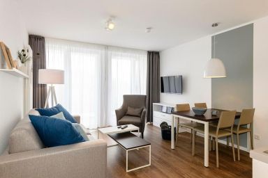 Deichhäuser Anna Küste - Apartment mit zwei Balkonen inklusive kostenfreier Schwimmbad- und Saunanutzung