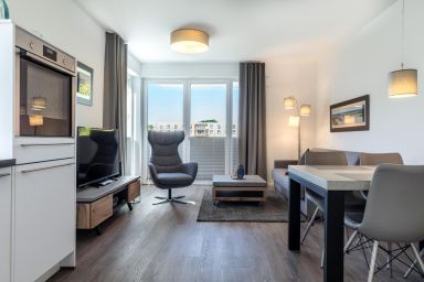 Aparthotel Ostseeallee - Rollstuhlfreundliches 2-Zimmer Apartment mit Terrasse und Saunabereich im Haus