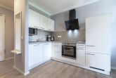 Offene KÃ¼che mit Backofen und GeschirrspÃ¼ler
