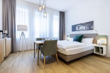 Ferienapartments am Krusespeicher - Topmodernes 1-Zimmer-Apartment für zwei Personen in außergewöhnlicher Hafenlage