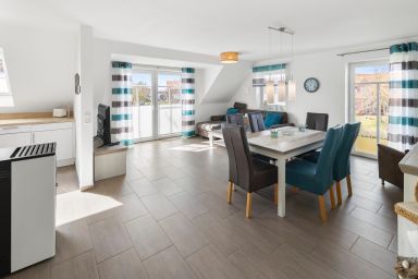 Sielresidenz - 85qm Ferienwohnung für 4 Pers. mit Kamin, Wärmekabine & Balkon direkt am Wasser