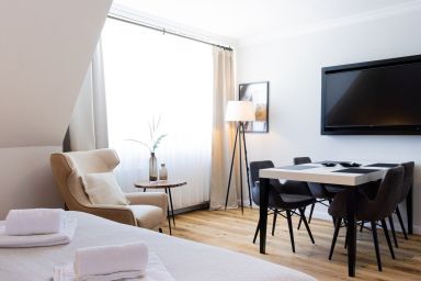 Strandnahe & hochwertige Ferienunterkunft, mit Gartenzugang und Fahrradunterstellplatz - Gemütliche moderne Ferienwohnung in Strandnähe
