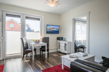 Haus Wellen und Meer - Maritime Ferienwohnung für 2 Personen in Hafennähe