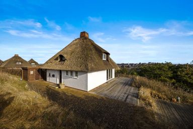Haus Sonnenland - "Traumhaftes Ferienhaus unter Reet mit Meerblick"