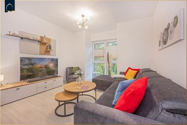 FeWo SonnenReich - Moderne Ferienwohnung mit Balkon – nur 600 m vom Strand entfernt