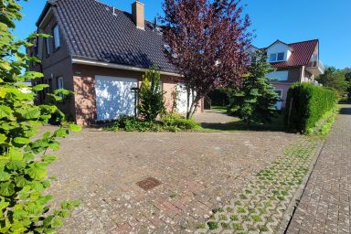 Ferienhaus Windland - Gemütliches Ferienhaus Windland in Dranske mit Sauna, Kamin & Garten