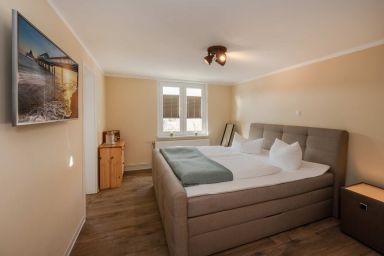 Haus Becker - Gemütliche Ferienwohnung in Heringsdorf mit großem Garten&Whirlpool – nur 550 m zum Strand