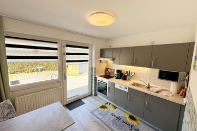 MR: Haus Inselperle mit Blick auf den Bodden - Wohnung 04 mit Terrasse und Boddenblick