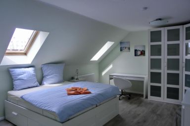 Ferienwohnung P15 - Zentrale 2- Zimmer-Ferienwohnung für 3 Personen mit Balkon