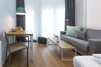 Apartmentvilla Anna See - Modernes Ferienapartment in Strandnähe mit sonniger Loggia und Sauna im Haus!