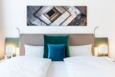 Wohn-/Schlafbereich mit Boxspringbett