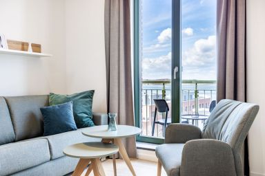 Krusespeicher - Luxus-Apartment mit Galerieschlafzimmer, Dachterrasse und einmaligem Hafenblick!