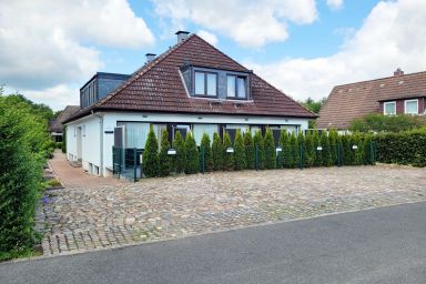 Hochwertige Ferienwohnung in ruhiger Lage mit eigener Terrasse, nur 7 Gehminuten zum Strand entfernt - Moderne Landhaus Ferienwohnung mit Sonnenterrasse in ruhiger Lage