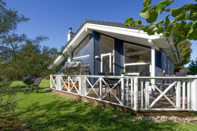 Holiday Vital Resort - 79m² Ferienhaus für 6 Personen und Hund mit Sauna und Kaminofen