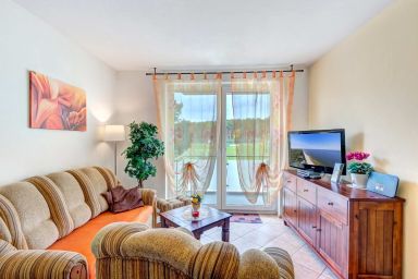 Ferienwohnung Strandblick 3 - Gemütliche Ferienwohnung mit Balkon – strandnah & familienfreundlich
