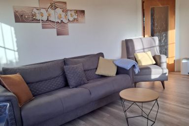 Haus am Brunnen - Ferienwohnung Orchidee