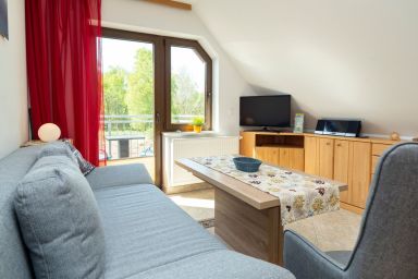 Haus Ahrens Wohnung 4 - Komfortable Ferienwohnung mit Balkon und Gartenblick im Haus Ahrens in Zingst
