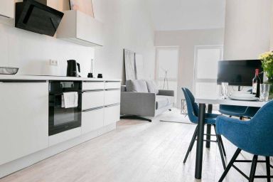 Ferienwohnung Deichzauber - Moderne Ferienwohnung Deichzauber mit überdachtem Balkon, WLAN und Flussblick