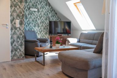 F: Haus Inselperle mit Blick auf den Bodden - Wohnung 05 mit Balkon und Boddenblick