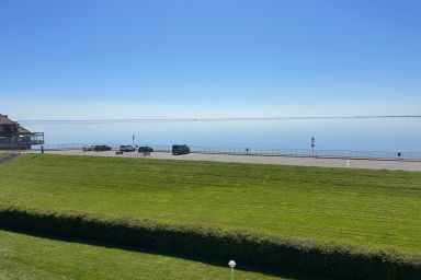 Gemütliche Ferienwohnung mit Wintergarten & Meerblick am Südstrand | Wohnung 123