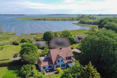 Familienferienhaus Rügenbrise - Gemeinsames Urlauben mit Steg und Boot auf Rügen - alles inklusive und 5 Bäder