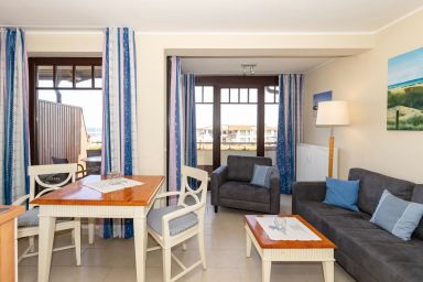 Urlaubsräume am Meer - Tolles Penthouse-Apartment am Yachthafen mit überdachtem Balkon und Meerblick